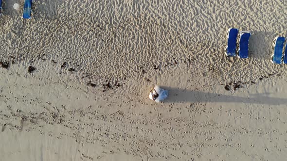 Top View of a Newly Married Couple Kissing at the Beach Dominican Republic
