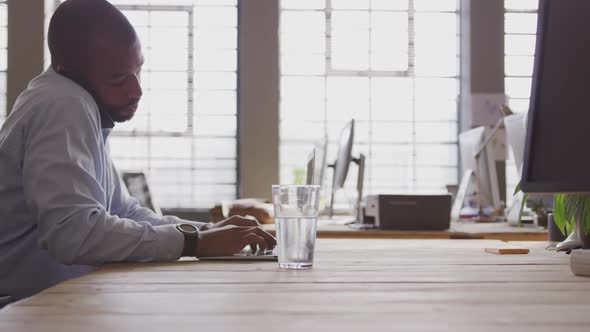 Young creative professional working in a modern office