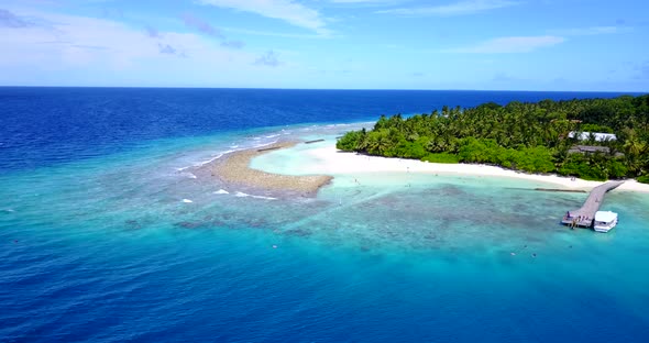 Wide angle drone abstract view of a sandy white paradise beach and blue sea background in best quali