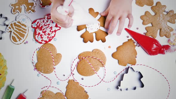 Decorating of Christmas gingerbread cookies