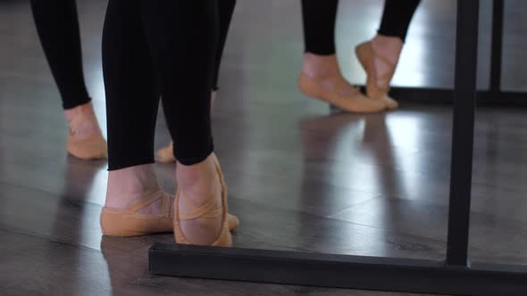 Hardworking Dancers Working Out Feet During Lesson