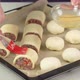 Smearing Egg Pies on Baking Sheet - VideoHive Item for Sale