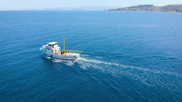 A Small Fishing Boat Goes To the Open Sea To Search for and Catch Salmon.