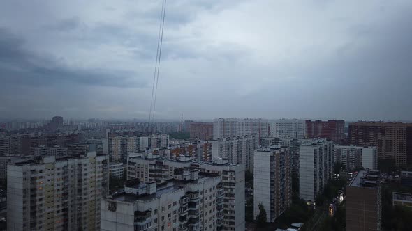 Heavy Thunderstorm Over a Big City. Stormy Front Goes Into the Distance. Weather Cataclysm, Rainy