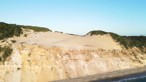 The ever changing eroding cliff faces of the Carlos sand blow at Rainbow Beach Queensland Australia