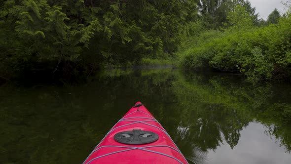 Adventure Concept Kayaking in Red Kayak