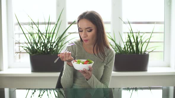 Healthy Nutrition. Woman Eating Vegetable Dieting Salad