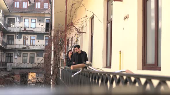 Couple holding hands and walking alt