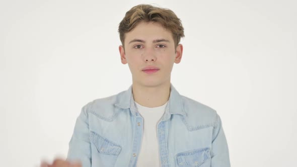 Young Man Showing Okay Sign on White Background