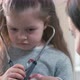 Kid putting stethoscope on - VideoHive Item for Sale