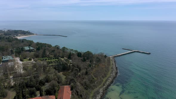 Aerial video with panoramic morning view of beautiful sandy beach