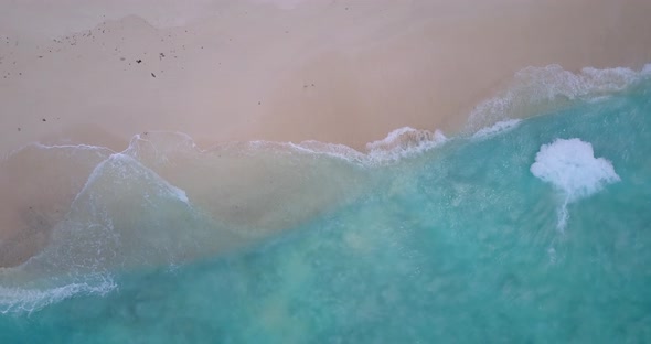 Beautiful drone copy space shot of a summer white paradise sand beach and blue sea background 