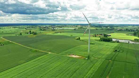 Wind turbines on green field in summer Poland