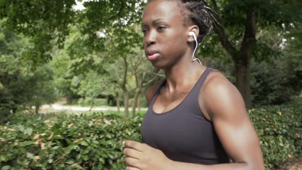 Beautiful american african woman running. Sport,training,fitness