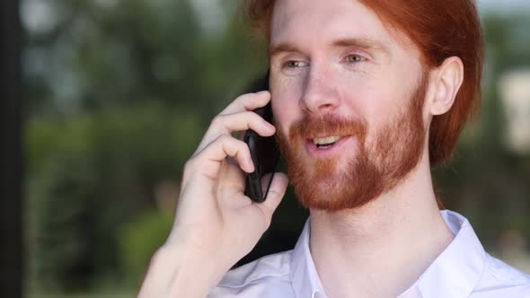 Handsome Man Talking on Phone