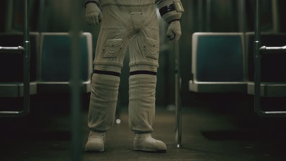 Astronaut Inside of the Old Non-modernized Subway Car in USA alt