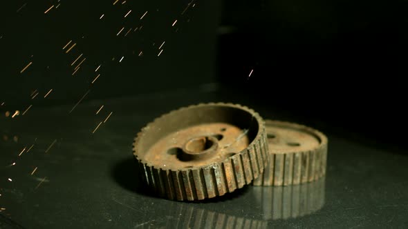 Sparks with gears in ultra slow motion 