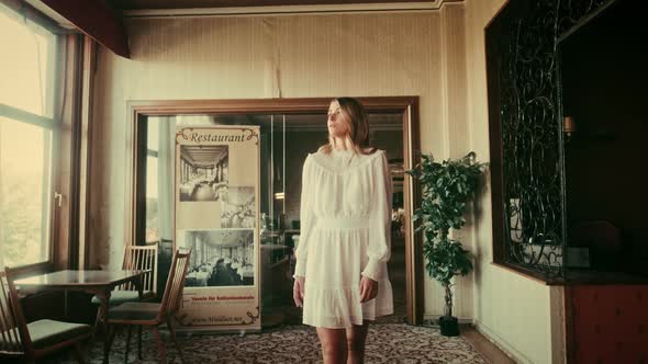 Woman in an old vintage Hotel