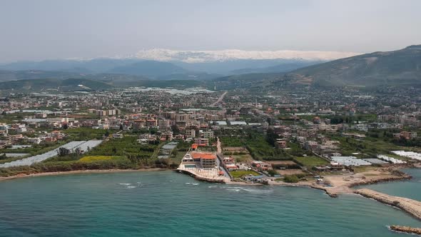 Coming Into Shot Of Beautiful Koura City Waterfront From Sky, Lebanon