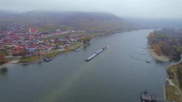 Cargo Pusher Boat on a Foggy Morning on the River Danube