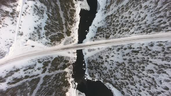 Winter road and river