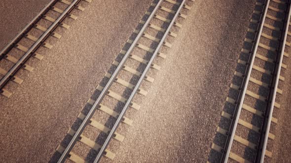 Loopable animation of the train tracking speed railroad from bird's eye view. HD