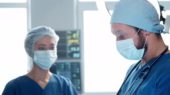 Professional medical doctors working in emergency medicine. Portrait of surgeon and the nurse.