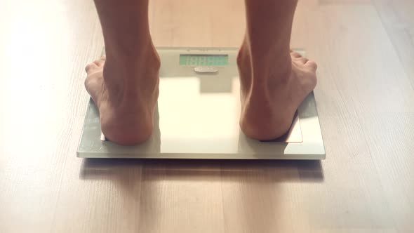 Walking Male Checking BMI Weight Loss. Human Barefoot Measuring Body Fat Overweight.