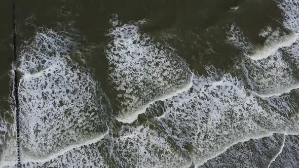 The sea seen from above when the camera tilts, you see rain showers in the sea.