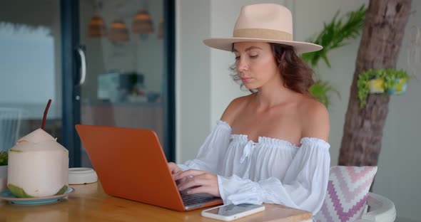 Woman Working Outdoors at Summer Cafe She Does Freelance Job Externally Millennial Concept