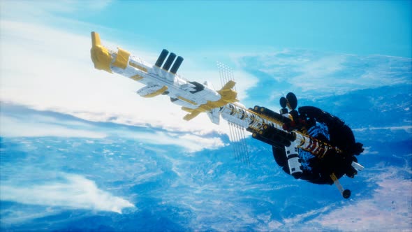 Futuristic Spaceship Near the Earth. Elements of This Image Furnished By NASA alt