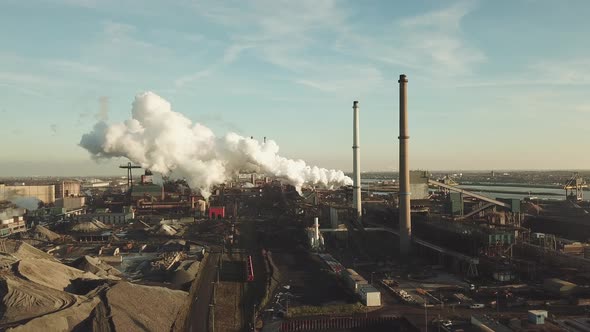 Aerial view of factory Tata Steel with smoking chimneys in Holland