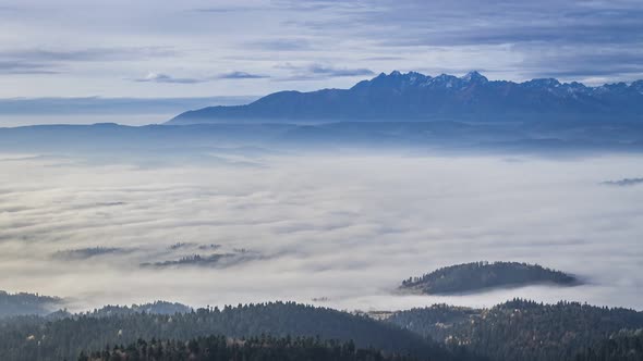 Flowing clouds at sunrise in the Tatra mountains, Poland, Timelapse