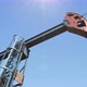 Low Angle Shot of Oil Pump Jack Pumping Crude Oil under Clear Blue Sunny Sky - VideoHive Item for Sale