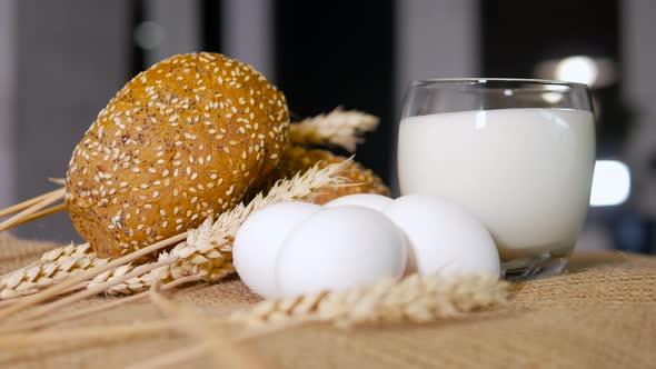 Fresh Pastries With Milk In A Glass And Chicken Eggs, Country Style Still Life With Food