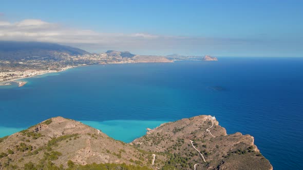 Aerial view of the Serra Gelada natural park with turquoise waters in the mediterranean sea. Alicant