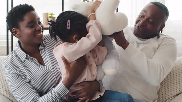 Happy Three Generation Afro American Family at Home Play with Teddy Bears Closeup Portrait