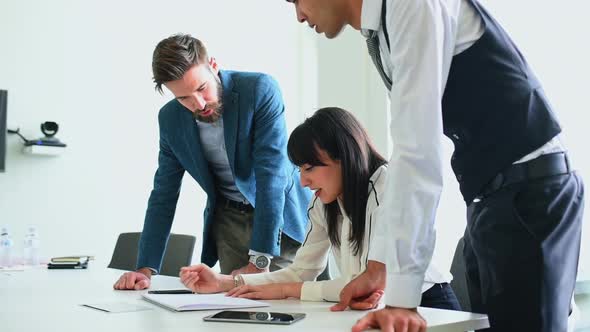 Coworkers discussing strategy