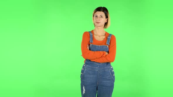 Lovely Girl Is Very Offended and Looks Away. Green Screen