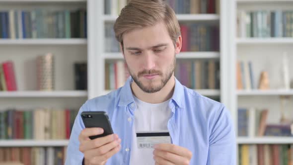 Portrait of Man Having Online Payment Failure on Smartphone