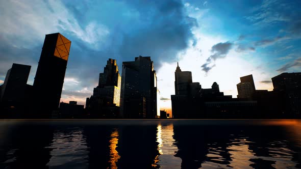 Skyline with Skyscrapers and Sea at Sunset