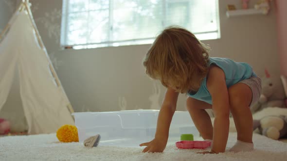 Slow Motion of Little Girl Playing in Her Room