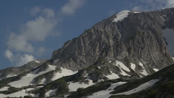 High Rocks and Clouds in the Blue Sky