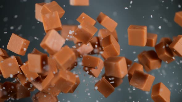 Super Slow Motion Shot of Salted Caramel Explosion on Dark Grey Background at 1000Fps