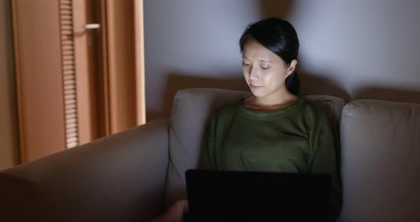 Woman use of mobile phone at home