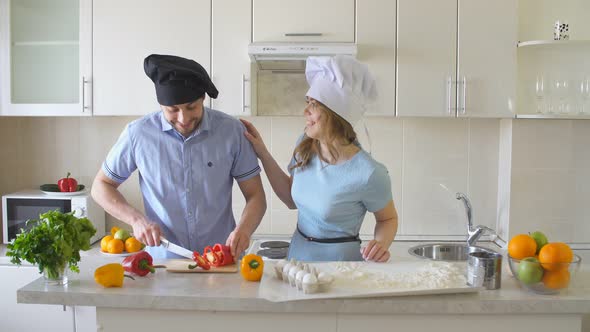 Happy Family Is Cooking in The Kitchen