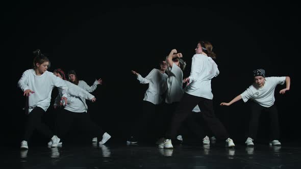 The Dancers Show Various Poses and Begin to Dance