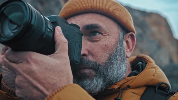 Portrait of Male Photographer with Digital Camera