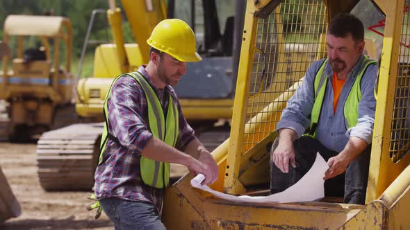Portrait of two blue collar workers alt