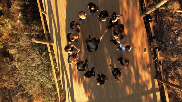 aerial view of people doing sports at sunset